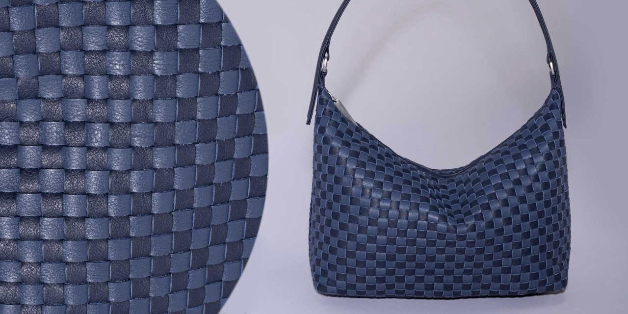 Gretchen Schultertasche aus geflochtenem Kalbsleder in Blau